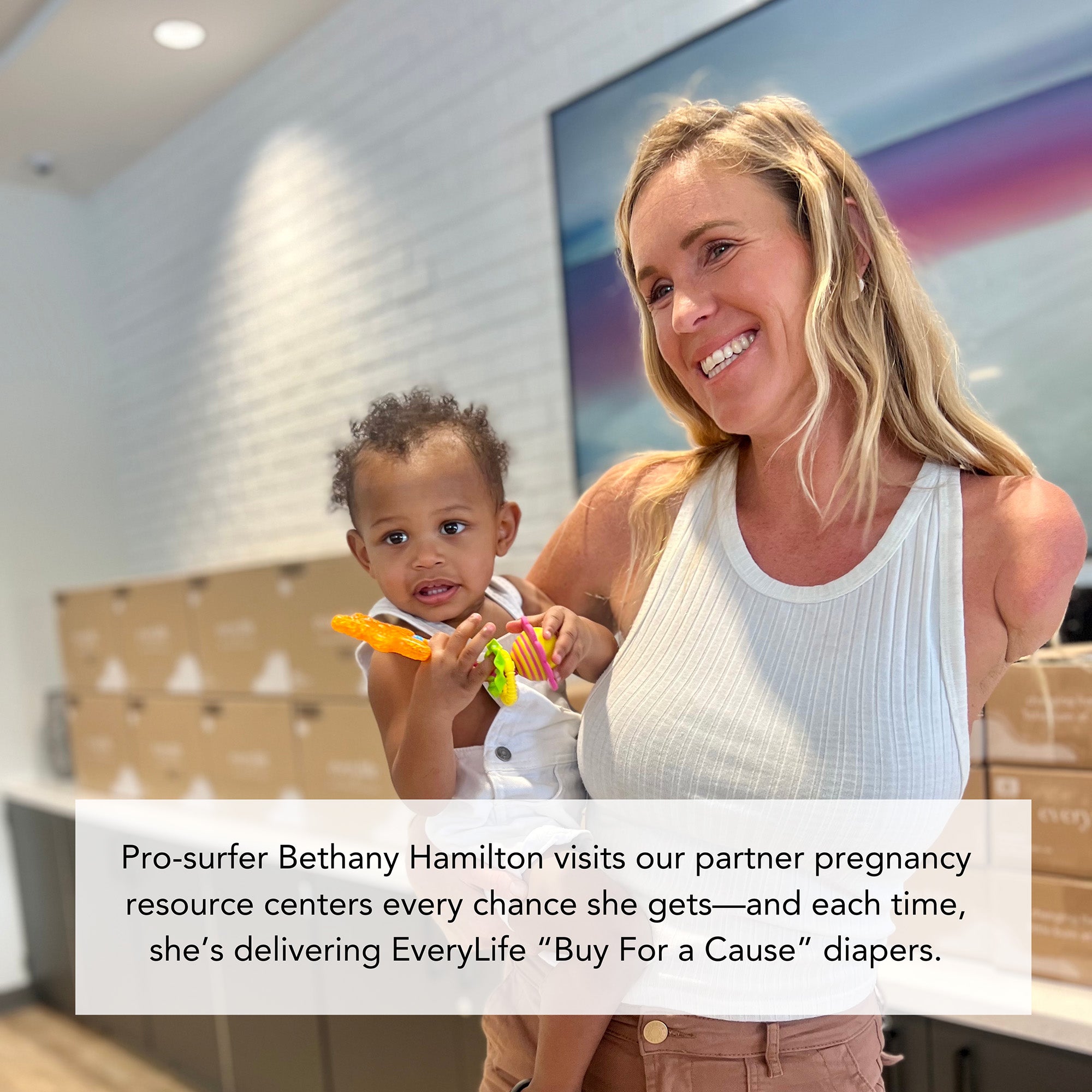 Pro-surfer Bethany Hamilton visits our partner pregnancy resources centers every chance she gets –– and each time, she's delivering EveryLife "Buy For a Cause" diapers.
